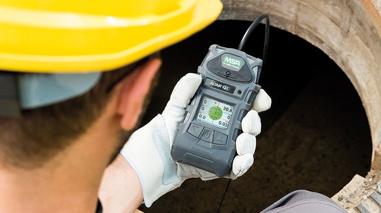 Technician Calibrating Gas Detector